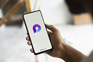 Category Historic EN Prints: microsoft loop logo is displayed on smartphone