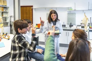 Middle school students participating in anatomy class