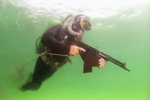 Military diver, gun, Black Sea