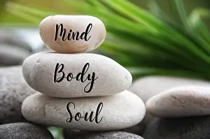 Mind, Body and Soul words engraved on zen stones with space for text