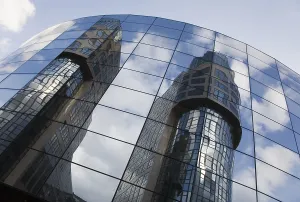 Ministry of the Interior reflected on the glass facade of the Haus am Wasser building in Berlin