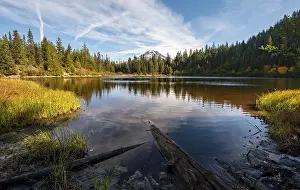 Mirror Lake with forest, back summit of volcano Mt Hood