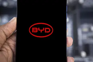 Category Historic EN Prints: Mobile phone with business logo of Chinese car manufacturer BYD Co