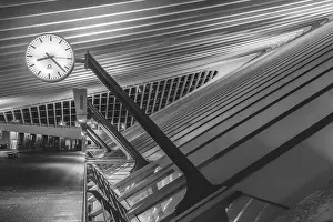 Modern architectural structure with large clock