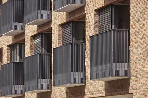 Framed Print : Modern brown brick residential buildings with balconies Framed Print : Modern brown brick residential buildings with balconies