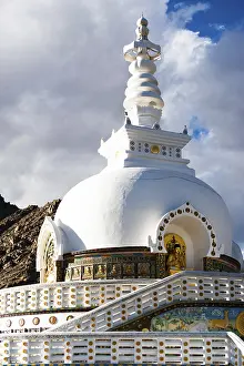 Modern Buddhist monument Shanti Stupa in the evening sunset