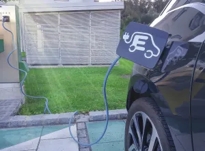 Modern electric car plugged