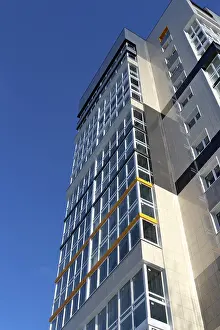 Modern high-rise apartment buildings against the blue sky low angle view