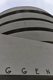 Modern round concrete building with curved lines