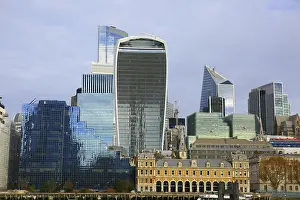 Framed Print : Modern skyscrapers with distinctive glass facades under clear skies