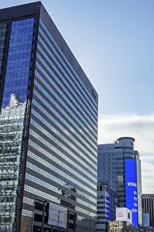Modern skyscrapers with glass facades in an urban environment in daylight