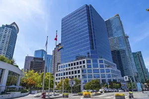 Modern skyscrapers rising against a blue sky