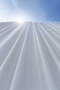 Modern white facade made of corrugated acrylic glass