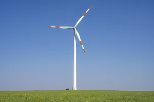 Modern wind turbine against a blue sky in Germany