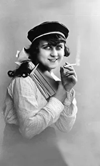 Modern youth, woman reading a book and smoking
