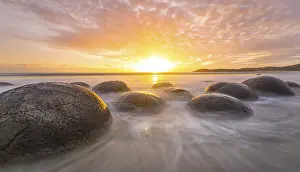 Moeraki boulders, at sunrise, geological formation
