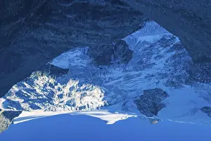 The Moiry glacier and mountain peaks are reflected in Lac de Chateaupre