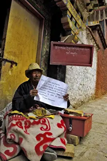 Monk with request, Tshurpu Convent near Lhasa