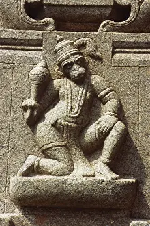 Monkey god Hanuman stone carving on pillar