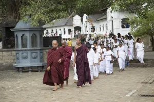 Monks at Dambulla cave Buddhist temple complex