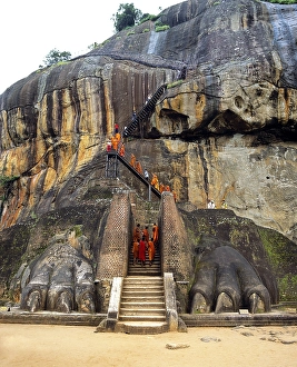 Monks at the Lion Staircase of the Rock of Sigiriya