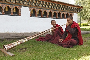 Monks playing tibetan horns, Chimi Temple