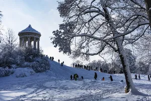 Monopteros, sledging, walker, winter with snow in the southern part of the English Garden