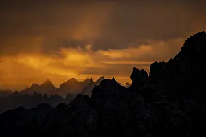 Montafon mountains with dramatic cloudy sky at sunrise