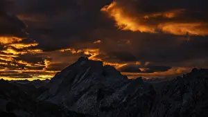 Montafon mountains with dramatic cloudy sky at sunrise
