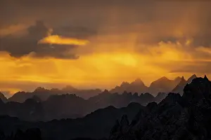 Montafon mountains with dramatic cloudy sky at sunrise
