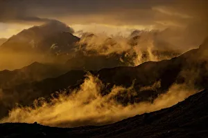 Montafon mountains with dramatic cloudy sky at sunset