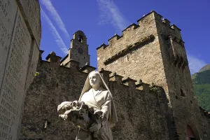 Monument in front of the Church of Saint-Andre or Church of the Templars in Luz-Saint-Sauveur