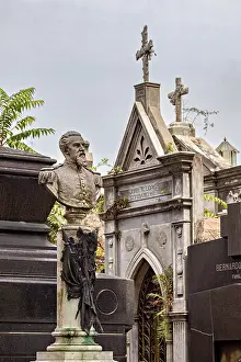 Monumental bust of a man in a cemetery