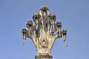 Monumental depiction of Buddha meditating under the protected of a seven-headed Naga serpent