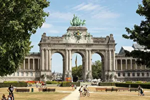 Monumental triumphal arch with Belgian national flag