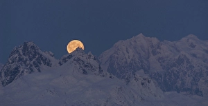 Category Mountain Landscapes Prints: The moon emerges from behind the mountains in Denali