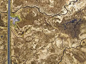 Top Down over Moors and Road A82 over Glencoe Valley from a drone