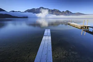 Morning atmosphere at mountain lake in front of mountains