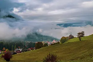 Morning mist over Seiser Alm in the Dolomites