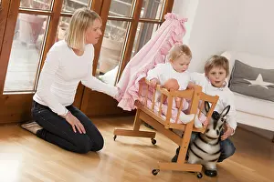 Mother with two children, 1 and 6 years ols