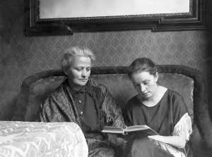 Mother and daughter reading a book