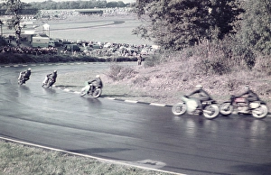 Motorbike racing on tarmac track possibly Goodwood, England c 1960