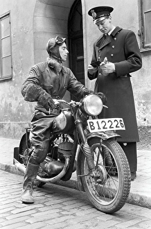 Motorcyclist in the 1950s. A young man dressed in the typical way the motorcyclists did in the 1950s