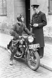 Motorcyclist in the 1950s. A young man dressed in the typical way the motorcyclists did in the 1950s