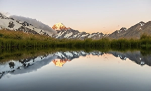Mount Cook at sunset, reflection in mountain lake