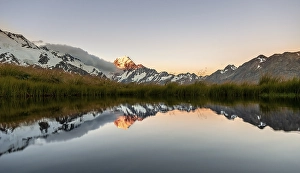 Mount Cook at sunset, reflection in mountain lake