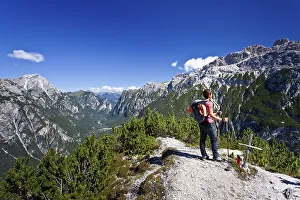 Mountain climber climbing the Monte Piano Climbing Route in Alta Pusteria Valley