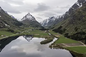 Mountain Eggenipa reflected in lake Bergheimsvatnet