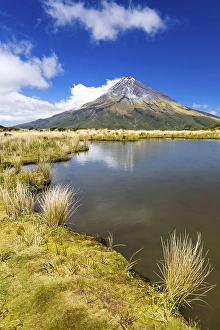 Mountain lake with the Mount Taranaki volcano