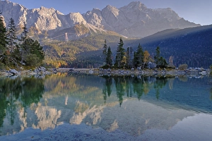 Mountain lake in front of steep mountains